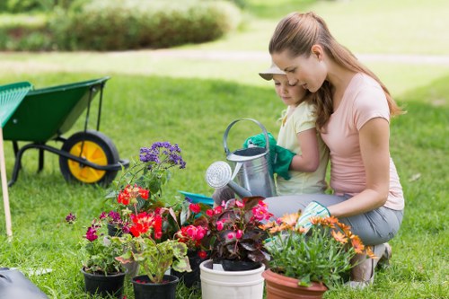 Seasonal garden maintenance work in a Shadwell outdoor space